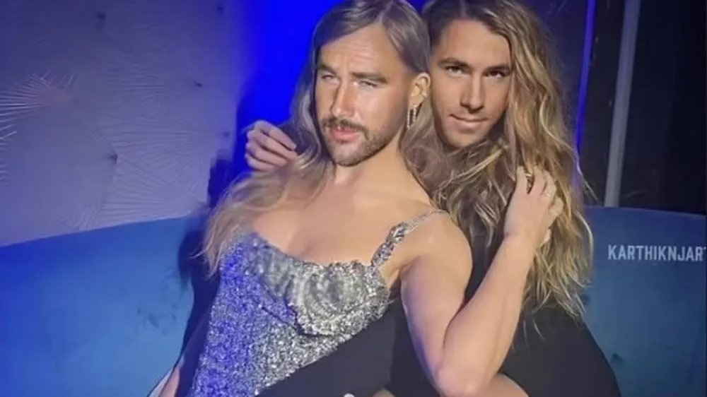 Ryan Reynolds Shares Faked Photo of Himself, Travis Kelce in a Sexy Clinch